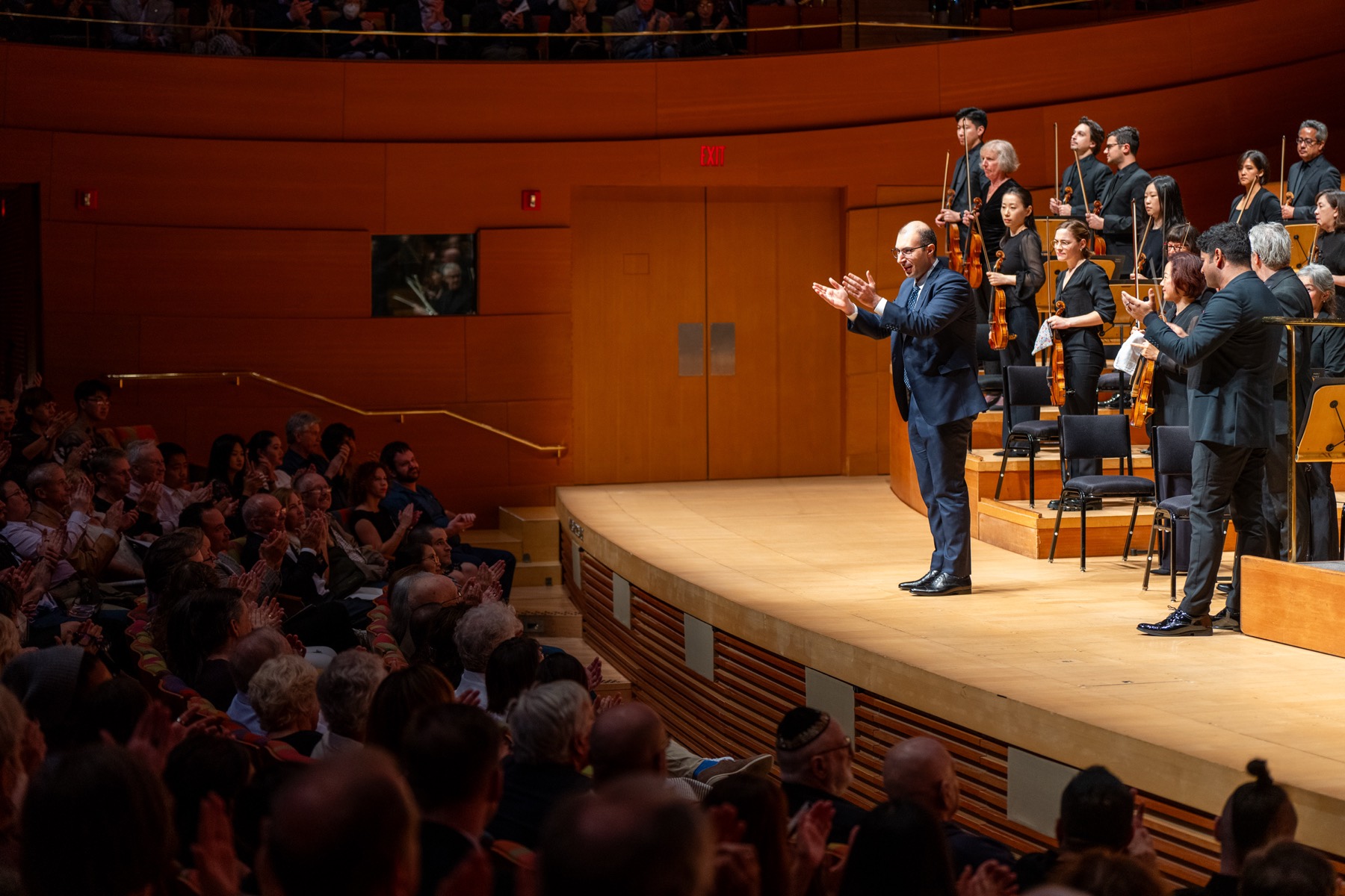 Saad Haddad on stage with the LA Phil after the premiere of his overture Aysheen